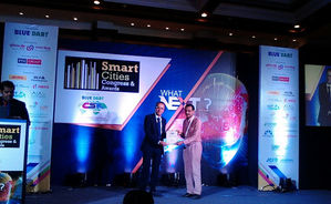 Dr. Ashish receiving 'Certificate of Merit' at World CSR Congress-2016