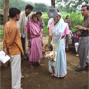 Weighing of Anganwadi Inmates by VHW