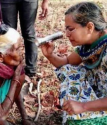 Checking%20patients%20in%20middle%20of%20the%20farm_edited.jpg