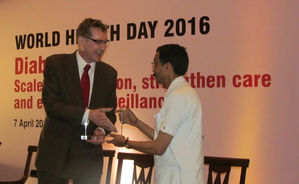 Dr. Ashish receiving WHO 'Public Health Champion' award from WHO India cheif Mr. Henk Bekedam for ou