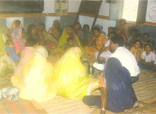 Dr. Subodh Gupta, explaining preparation of MAHAN developed ORS (Oral Rehydration Solution) to local